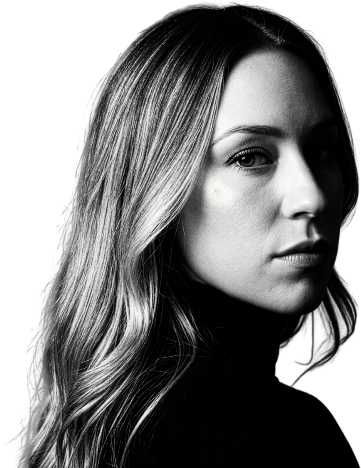 Meagan Angelucci, photographed against a plain ground, turned toward the camera.